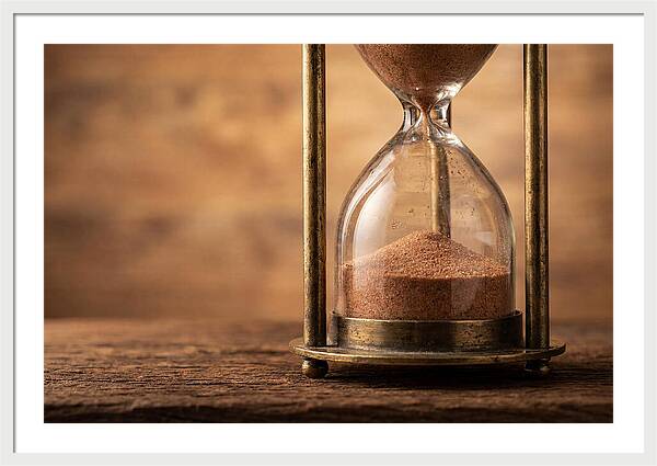 Antique Hourglass On Wood Surface