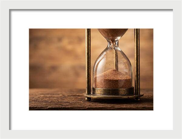 Antique Hourglass On Wood Surface
