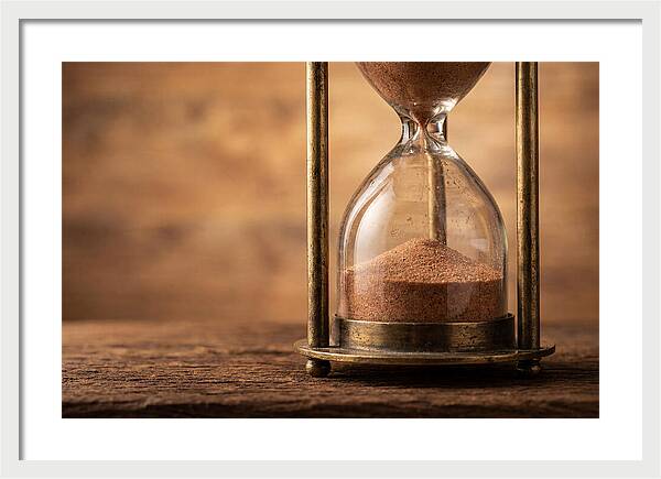 Antique Hourglass On Wood Surface