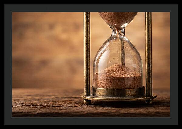 Antique Hourglass On Wood Surface
