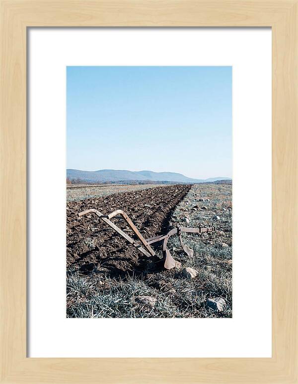 Antique Plow In Freshly Turned Earth
