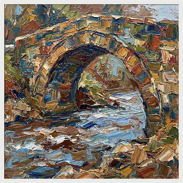 Arch Bridge Over Flowing Stream