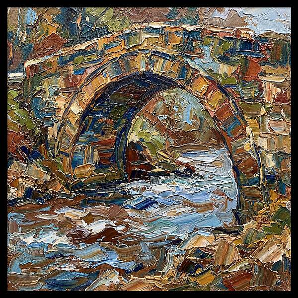 Arch Bridge Over Flowing Stream