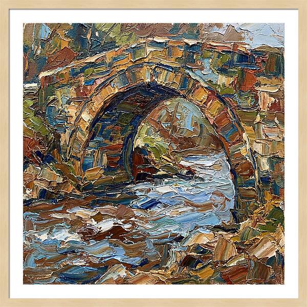 Arch Bridge Over Flowing Stream