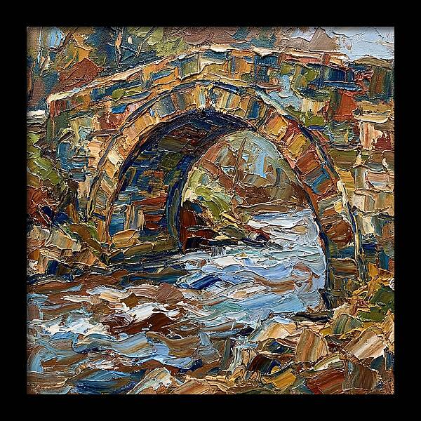 Arch Bridge Over Flowing Stream