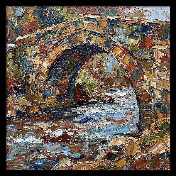 Arch Bridge Over Flowing Stream
