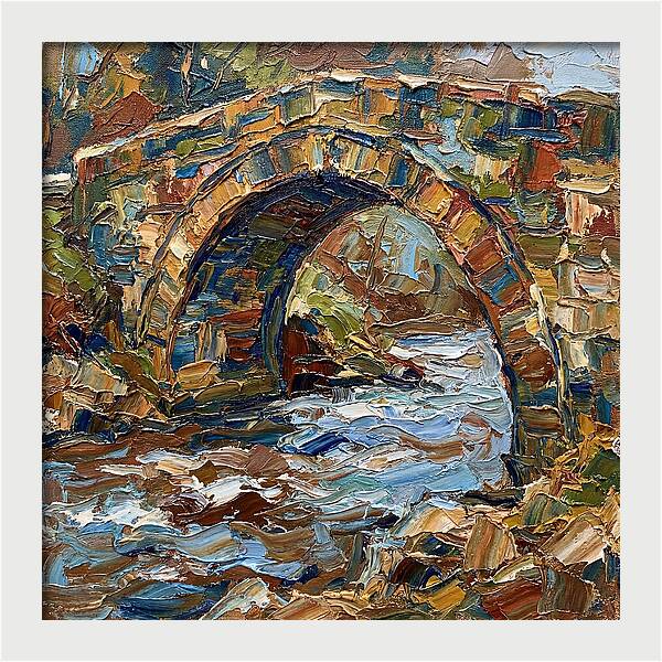 Arch Bridge Over Flowing Stream