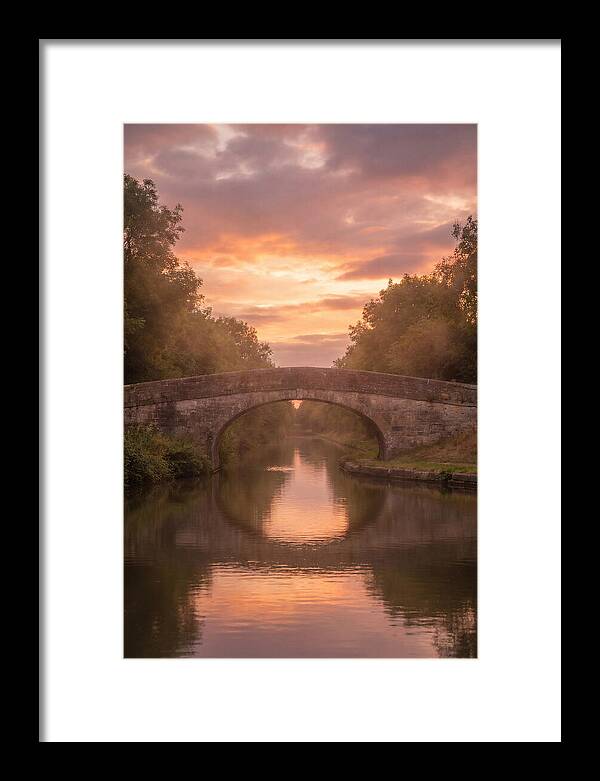 Arched Bridge Over Tranquil Canal