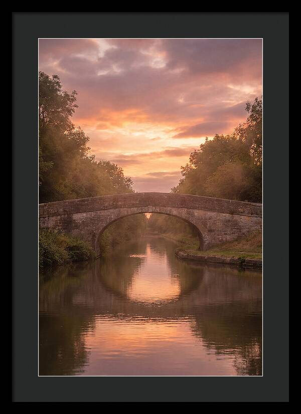 Arched Bridge Over Tranquil Canal