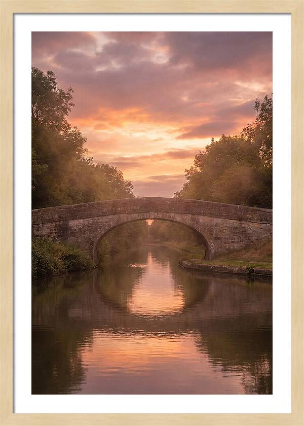 Arched Bridge Over Tranquil Canal