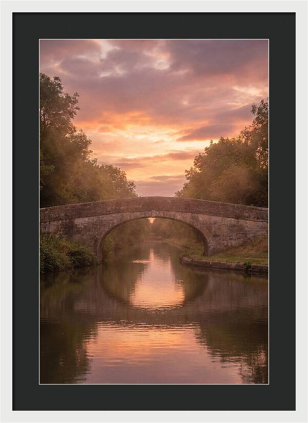 Arched Bridge Over Tranquil Canal