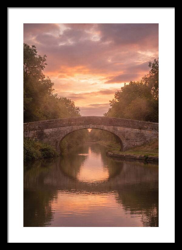 Arched Bridge Over Tranquil Canal