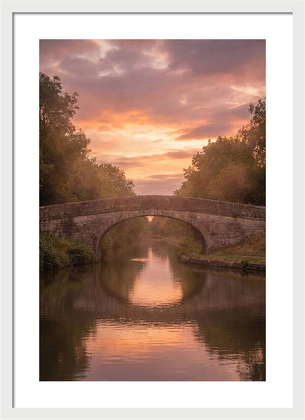 Arched Bridge Over Tranquil Canal