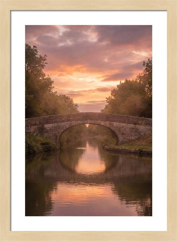 Arched Bridge Over Tranquil Canal