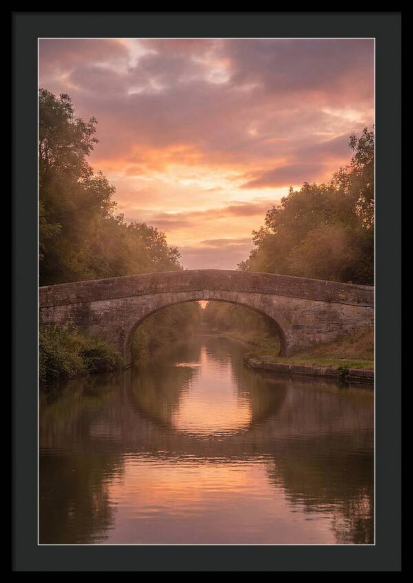 Arched Bridge Over Tranquil Canal