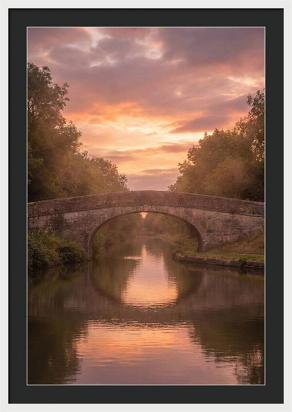 Arched Bridge Over Tranquil Canal