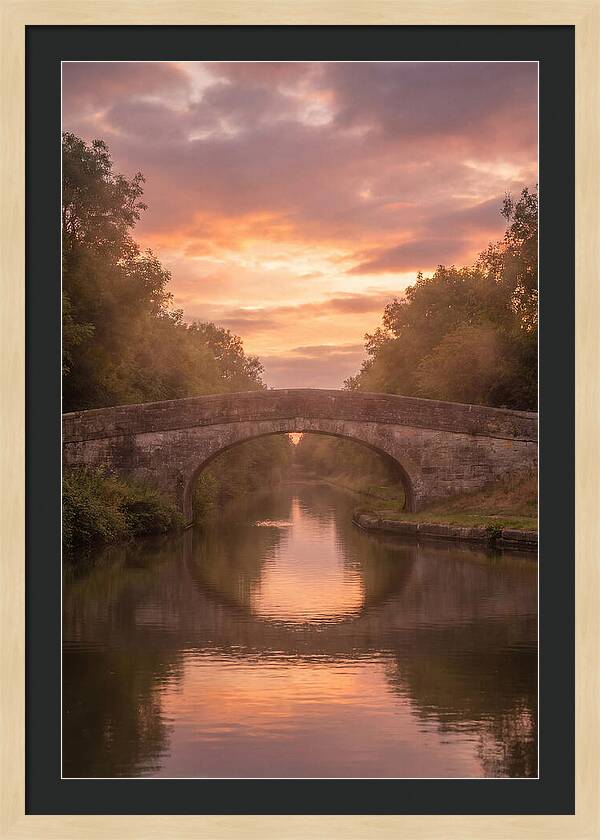Arched Bridge Over Tranquil Canal