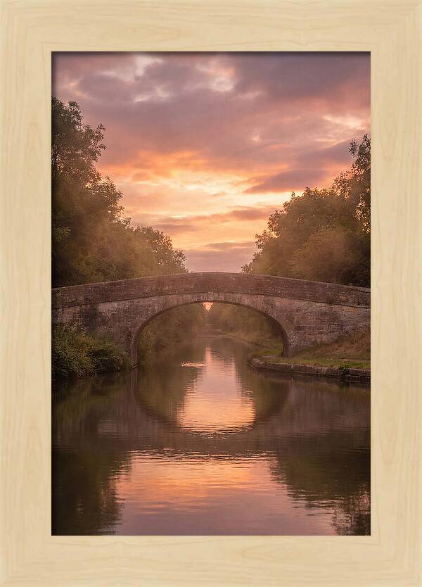 Arched Bridge Over Tranquil Canal
