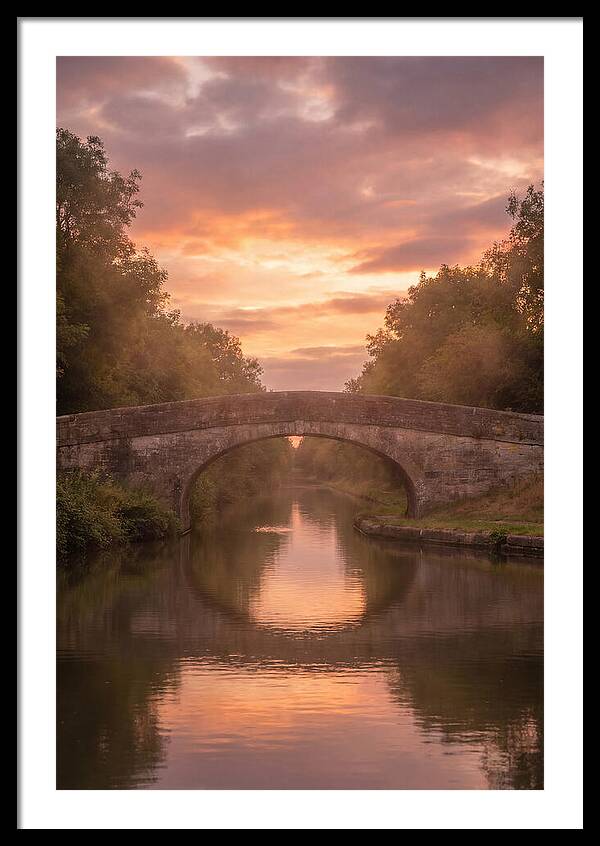 Arched Bridge Over Tranquil Canal
