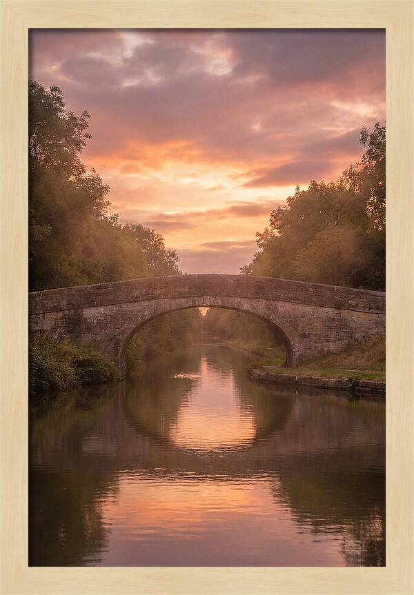 Arched Bridge Over Tranquil Canal