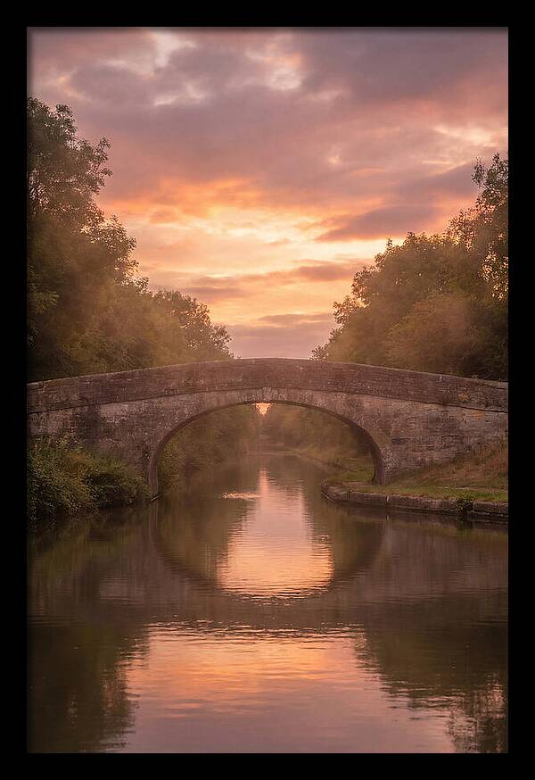 Arched Bridge Over Tranquil Canal