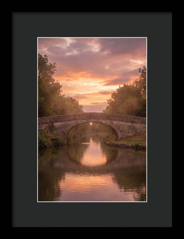 Arched Bridge Over Tranquil Canal