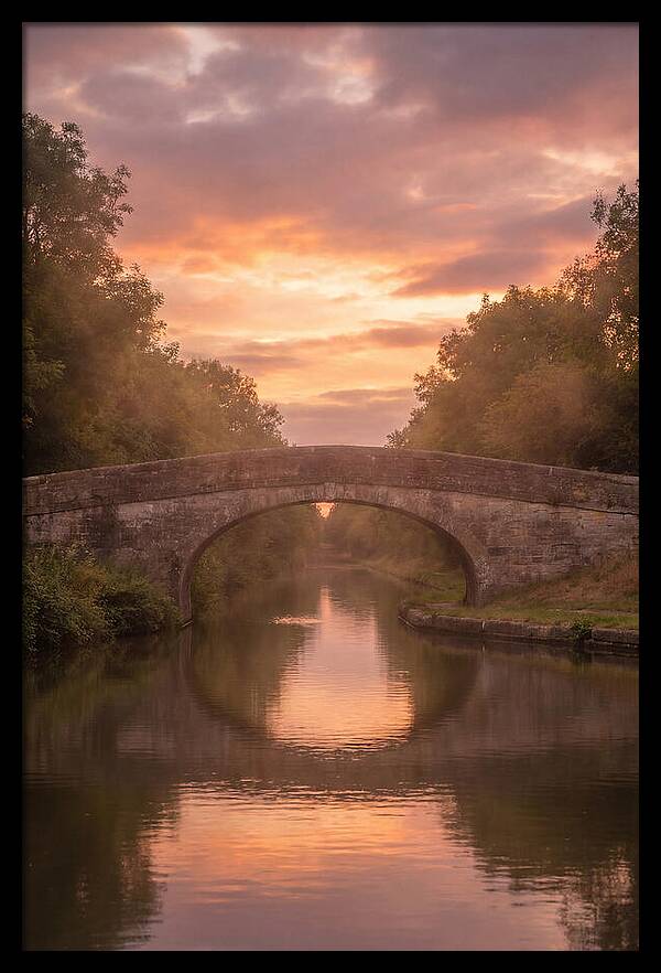 Arched Bridge Over Tranquil Canal