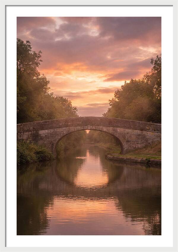 Arched Bridge Over Tranquil Canal