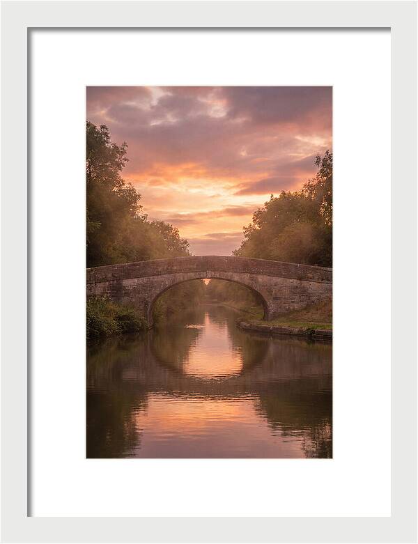 Arched Bridge Over Tranquil Canal