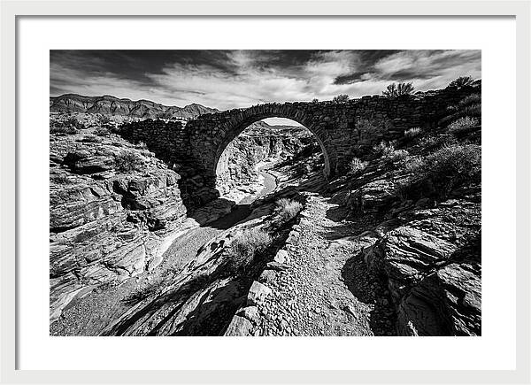 Arching Stone Bridge Over Canyon