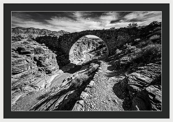 Arching Stone Bridge Over Canyon
