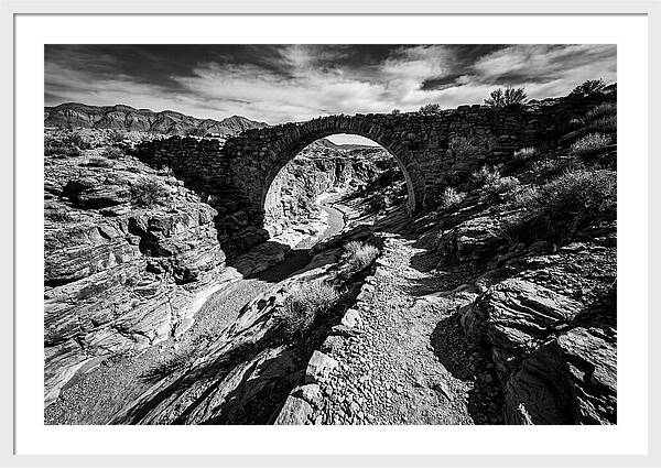 Arching Stone Bridge Over Canyon