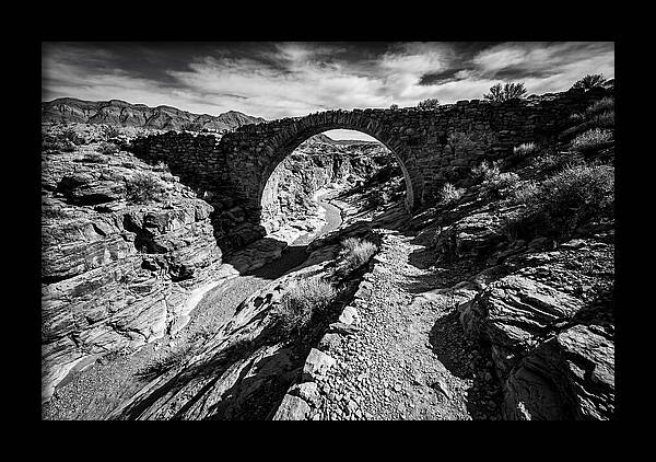 Arching Stone Bridge Over Canyon