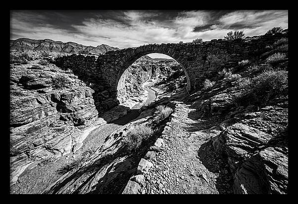 Arching Stone Bridge Over Canyon