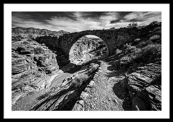 Arching Stone Bridge Over Canyon