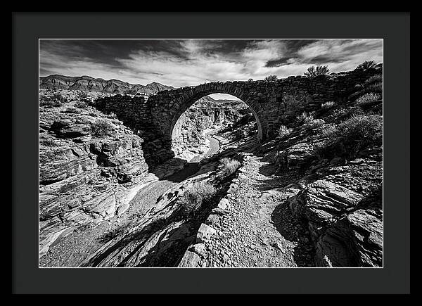 Arching Stone Bridge Over Canyon