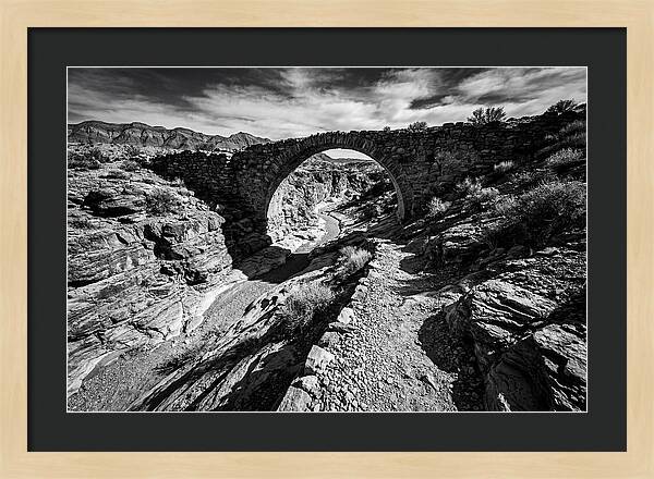 Arching Stone Bridge Over Canyon