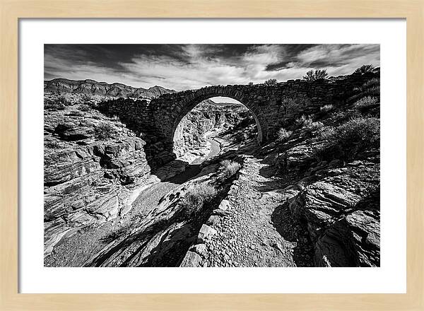 Arching Stone Bridge Over Canyon