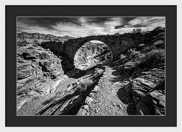Arching Stone Bridge Over Canyon