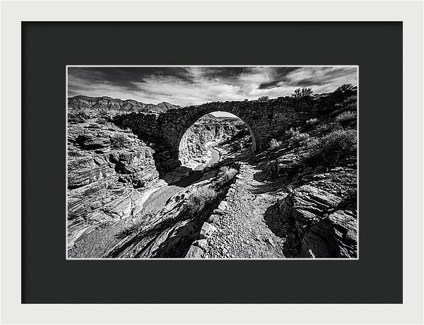 Arching Stone Bridge Over Canyon
