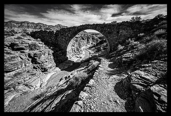 Arching Stone Bridge Over Canyon