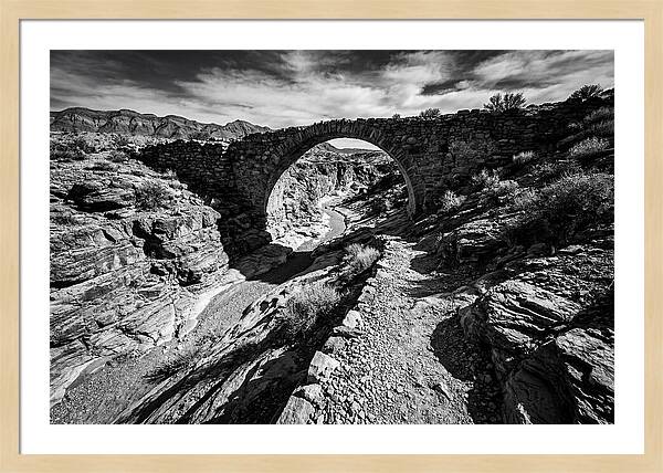Arching Stone Bridge Over Canyon
