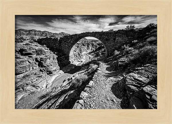 Arching Stone Bridge Over Canyon