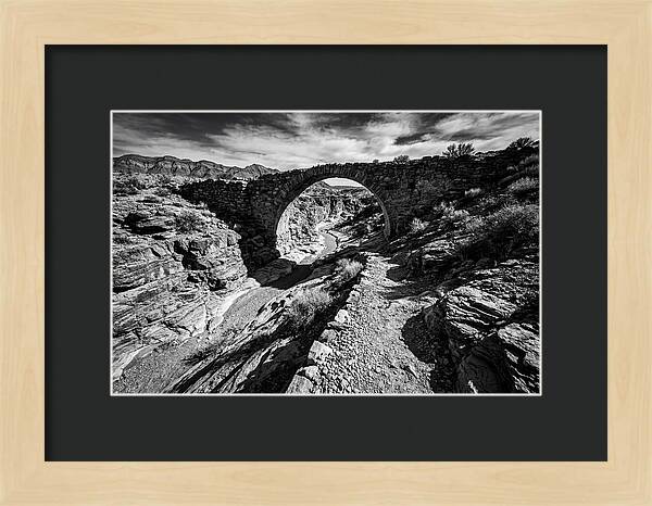 Arching Stone Bridge Over Canyon