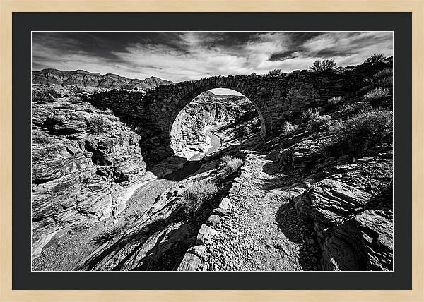 Arching Stone Bridge Over Canyon