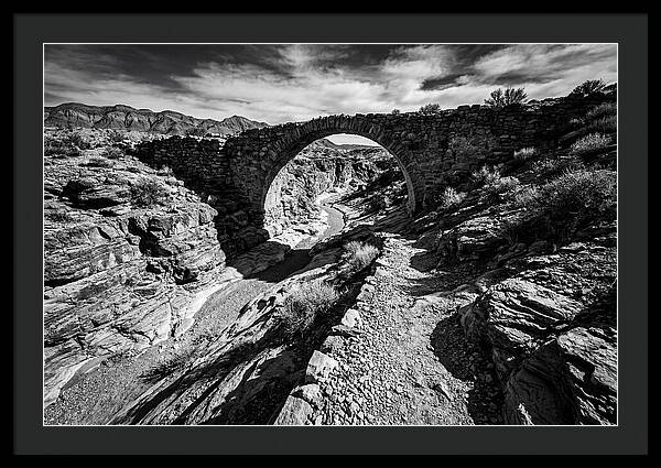 Arching Stone Bridge Over Canyon