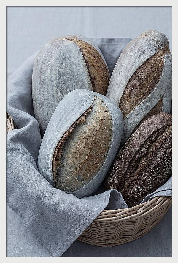 Artisan Bread Loaves In Basket