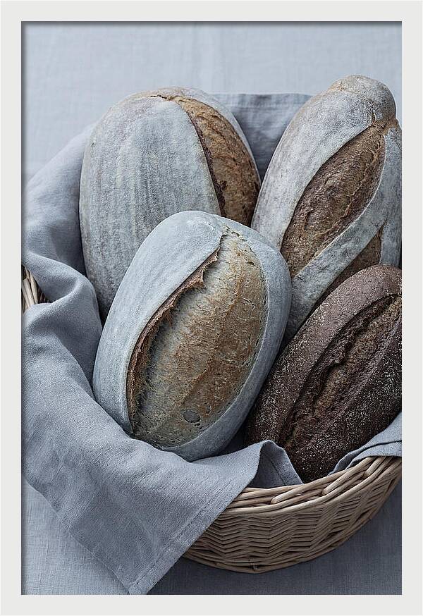 Artisan Bread Loaves In Basket