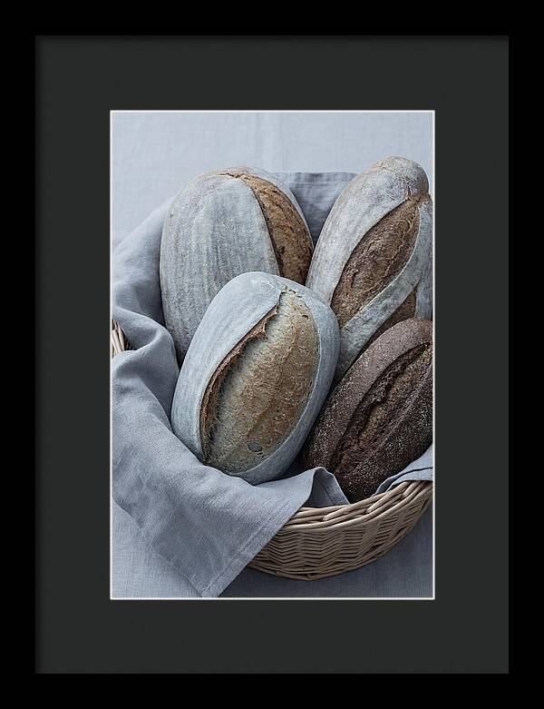 Artisan Bread Loaves In Basket