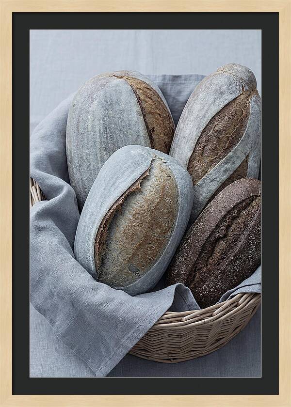 Artisan Bread Loaves In Basket